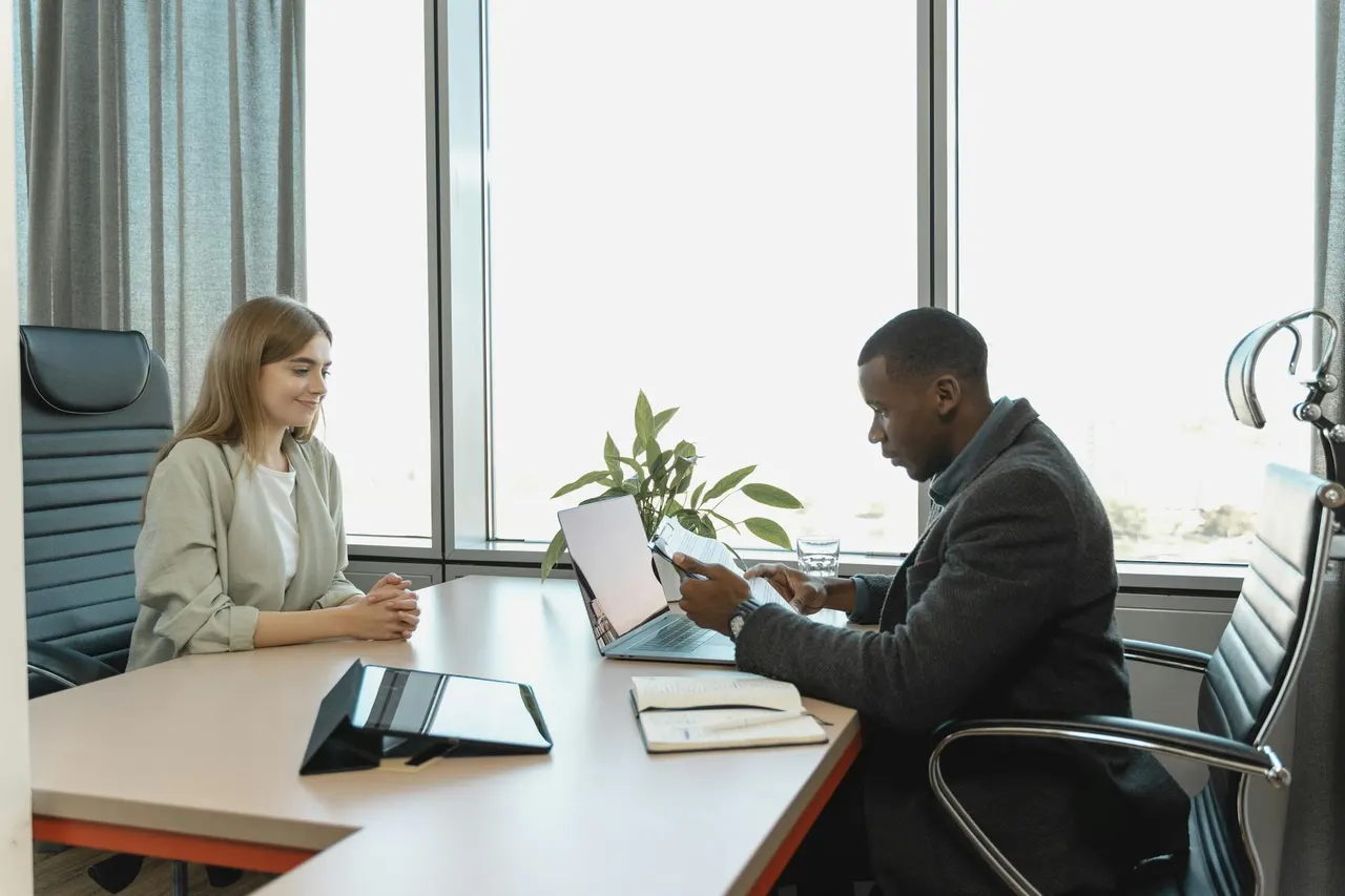 New Tomorrow Staffing team helping a job seeker