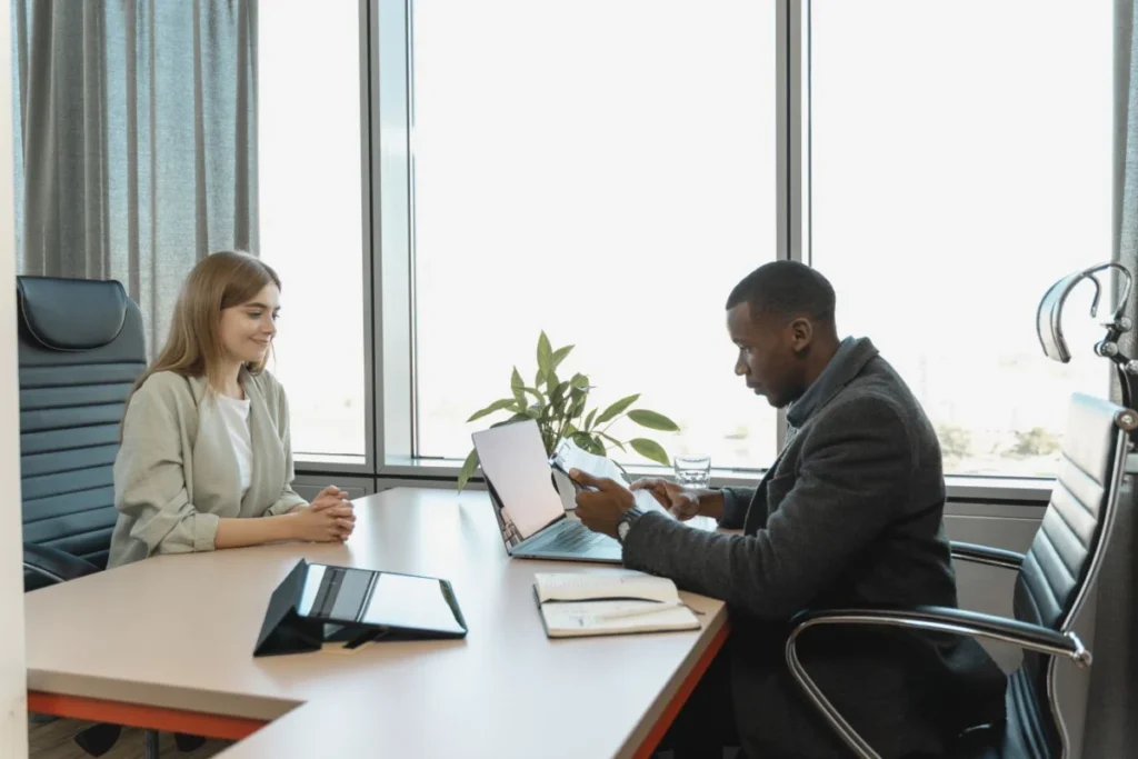 Business meeting with professionals discussing a job opportunity