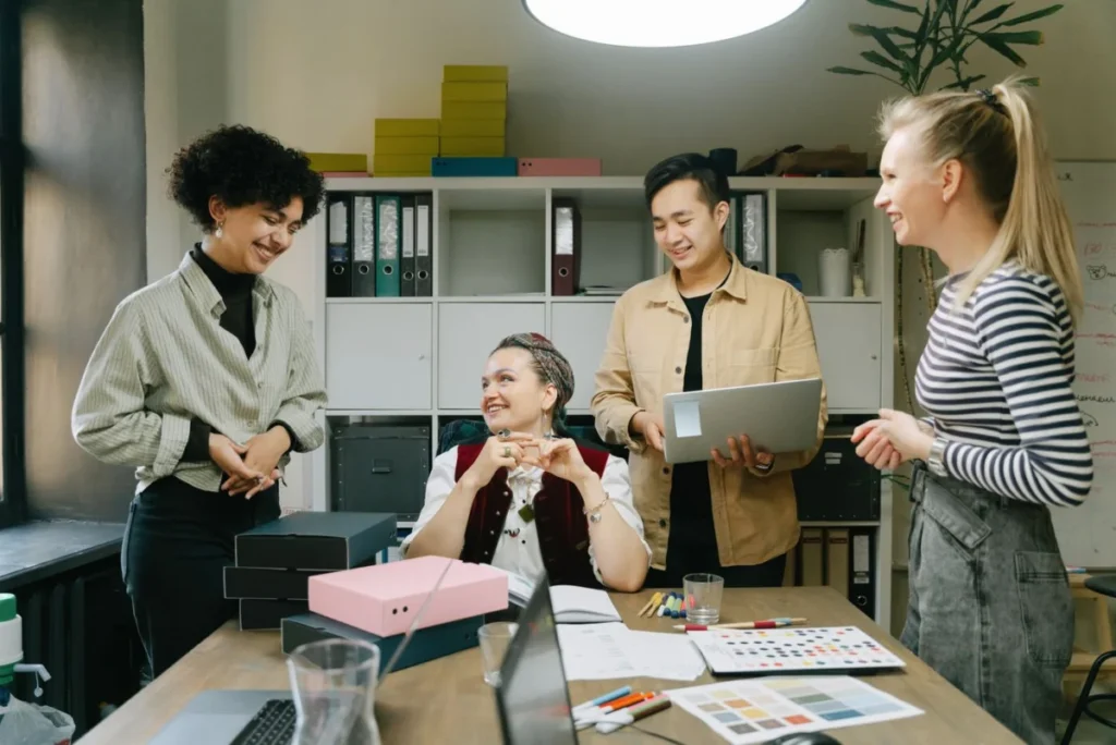 Colleagues talking during a team meeting