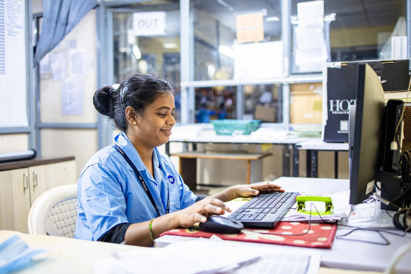 Woman working on a computer in one of many administrative jobs