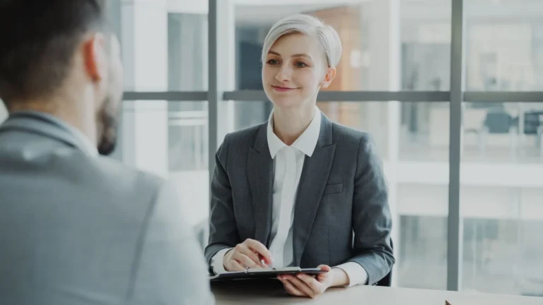 Recruiter interviewing a candidate, a moment where job interview tips help