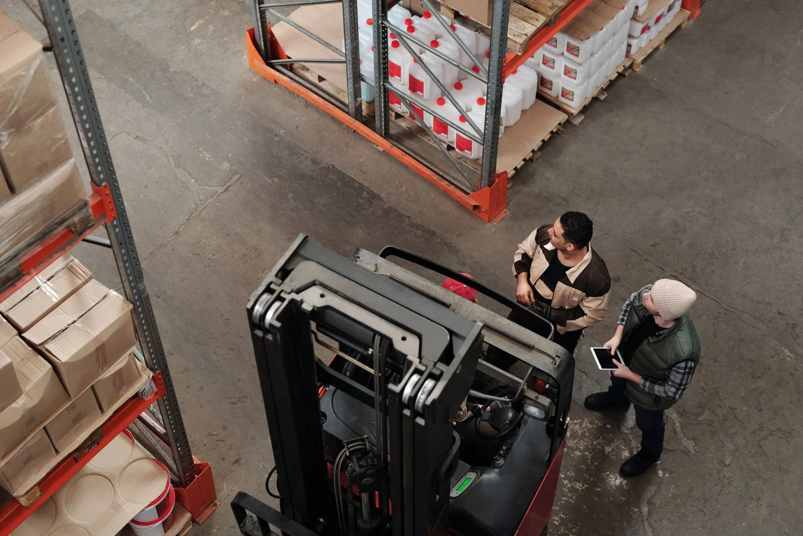 Worker organizing inventory during a seasonal staffing peak